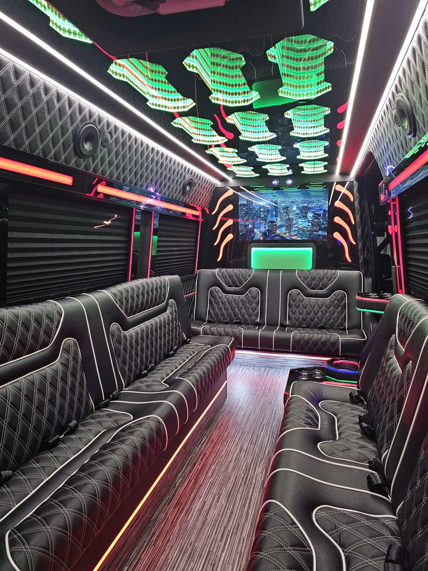 Limo Sprinter interior with perimeter lounge seating and ambient lighting